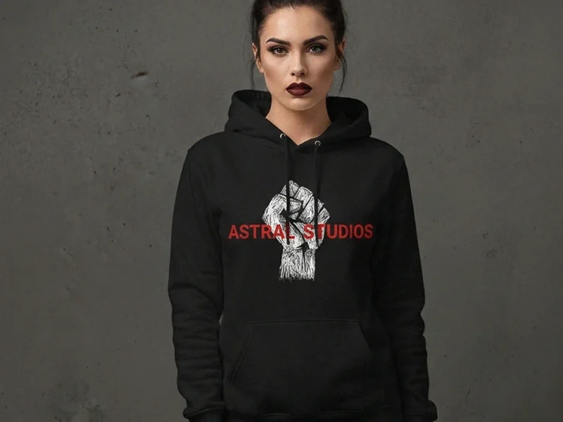 REbel model Person in black hoodie with design